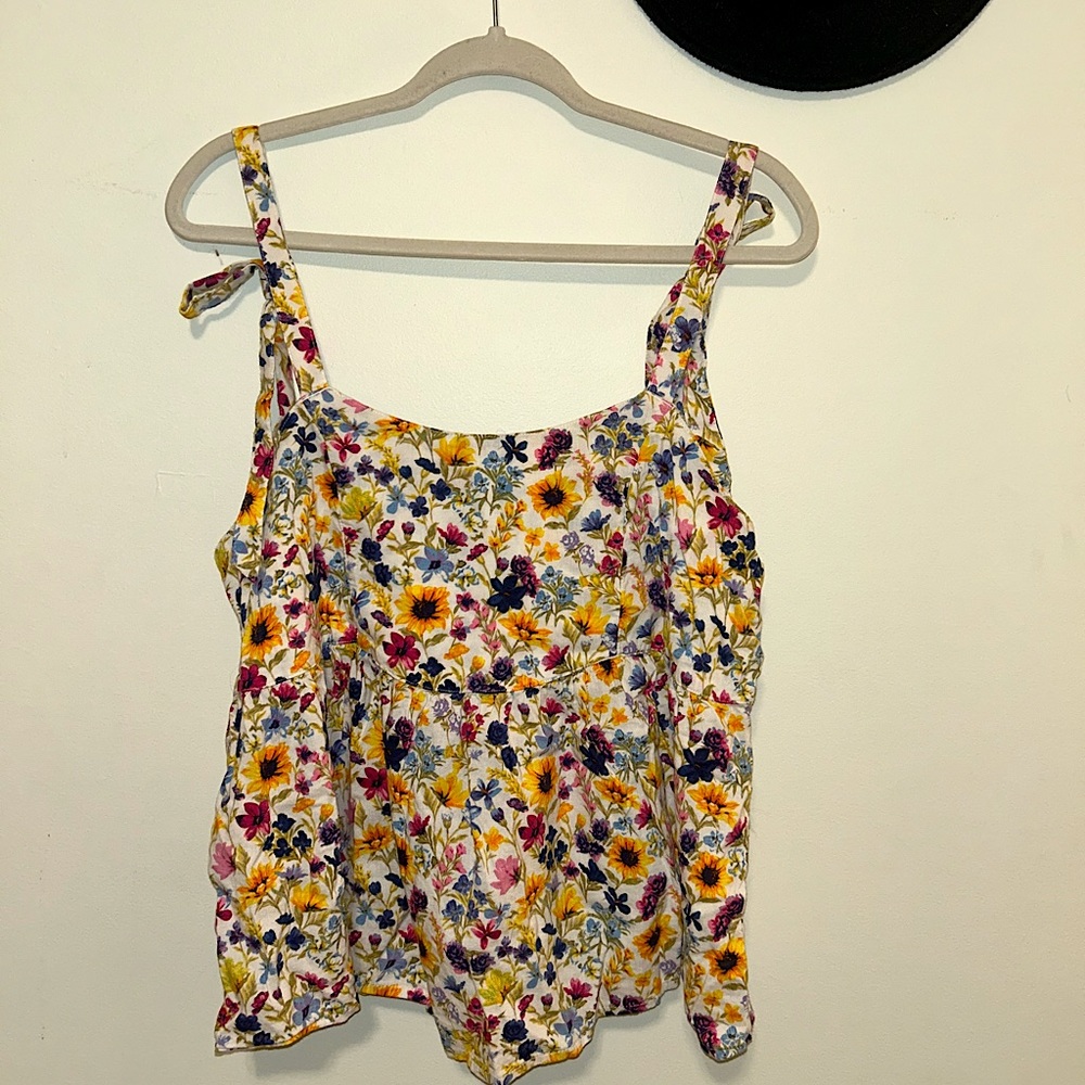 Tight strap top. Beautiful vibrant floral in brand new condition.